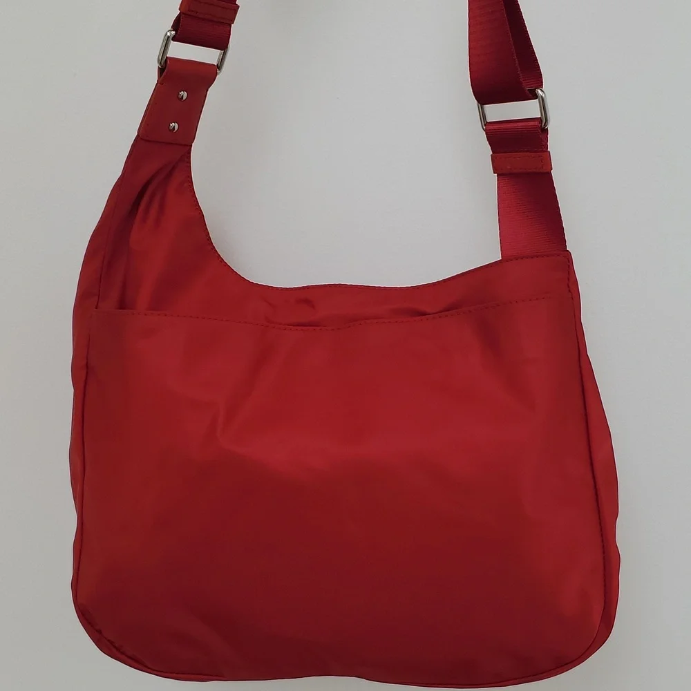 Tumi Pucket E/W Flap Crossbody Messenger Bag in Red with Silver Hardware